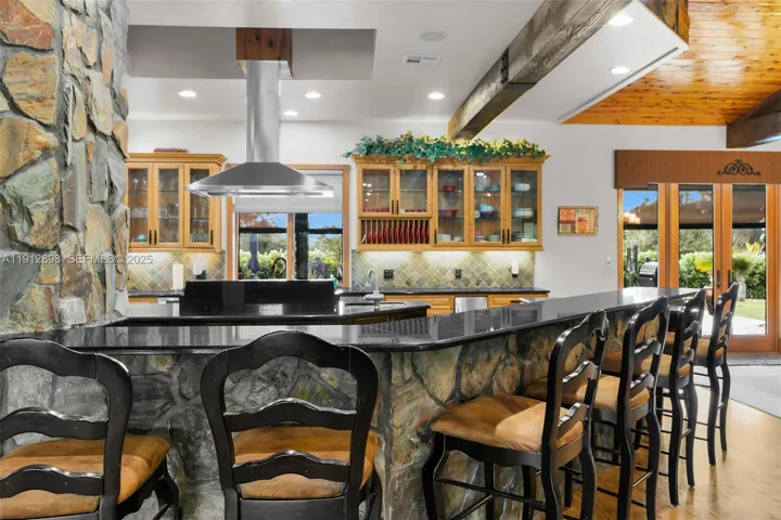 Stone archway to kitchen