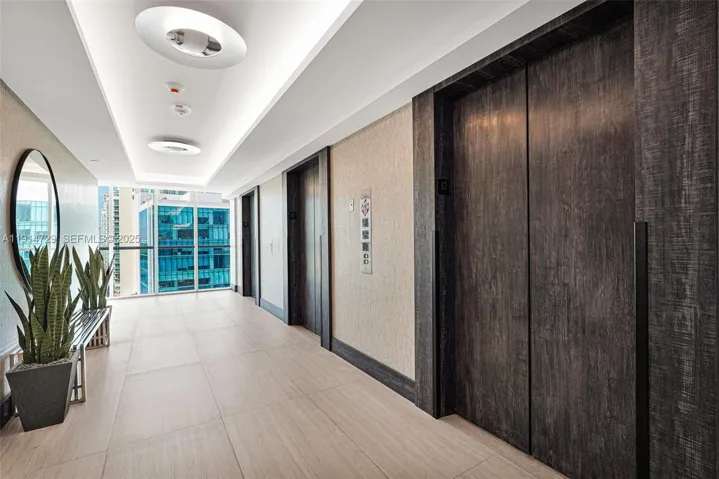 unit's hallway to the elevator area