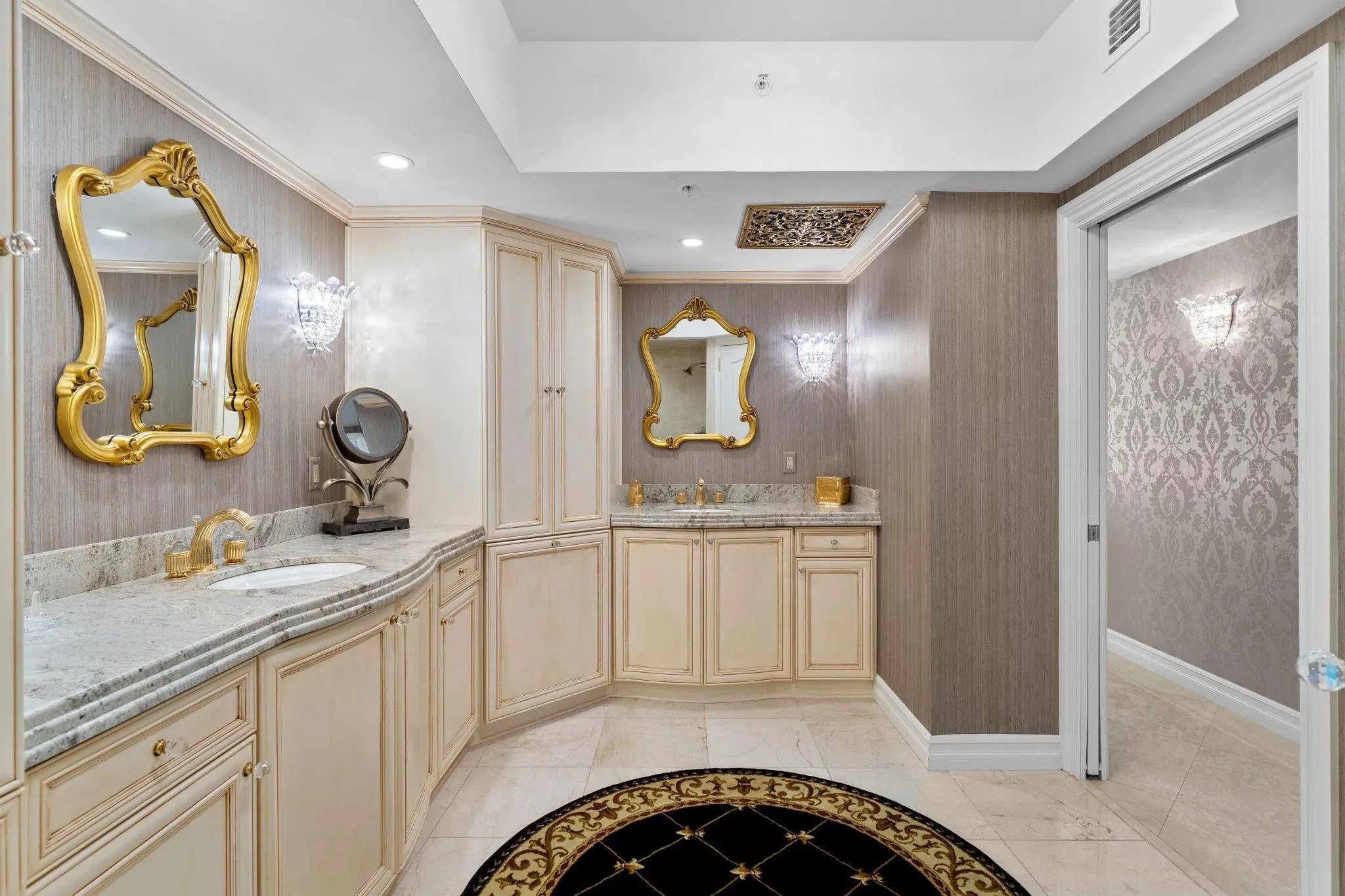 Completely redesigned with upgraded cabinets, lighting and marble counter-tops