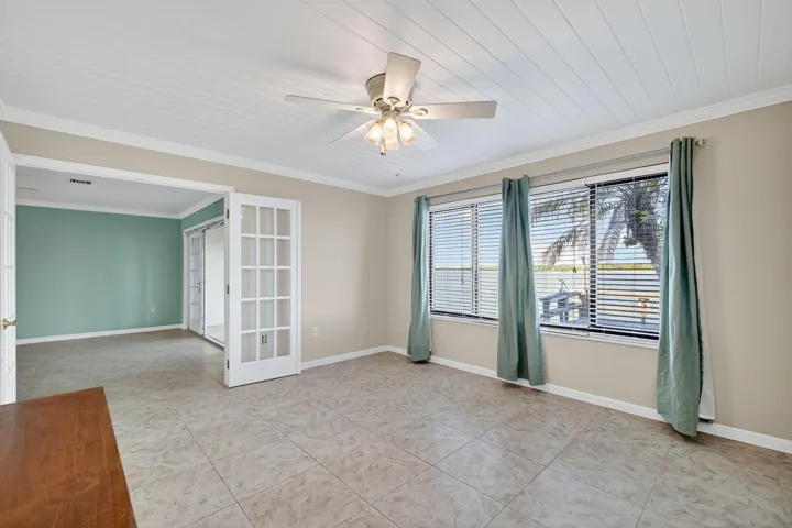 MASTER BEDROOM WITH DIRECT WATER VIEWS