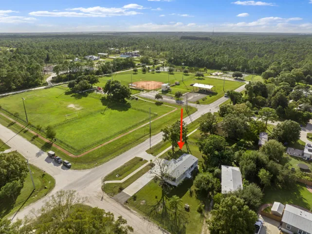Aerial view of home and lot