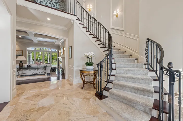 Foyer With Winding Staircaase