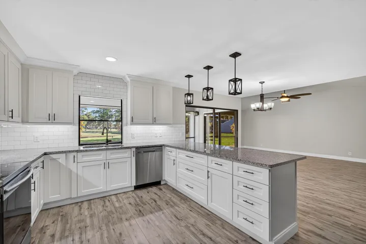 Kitchen opens to great room.