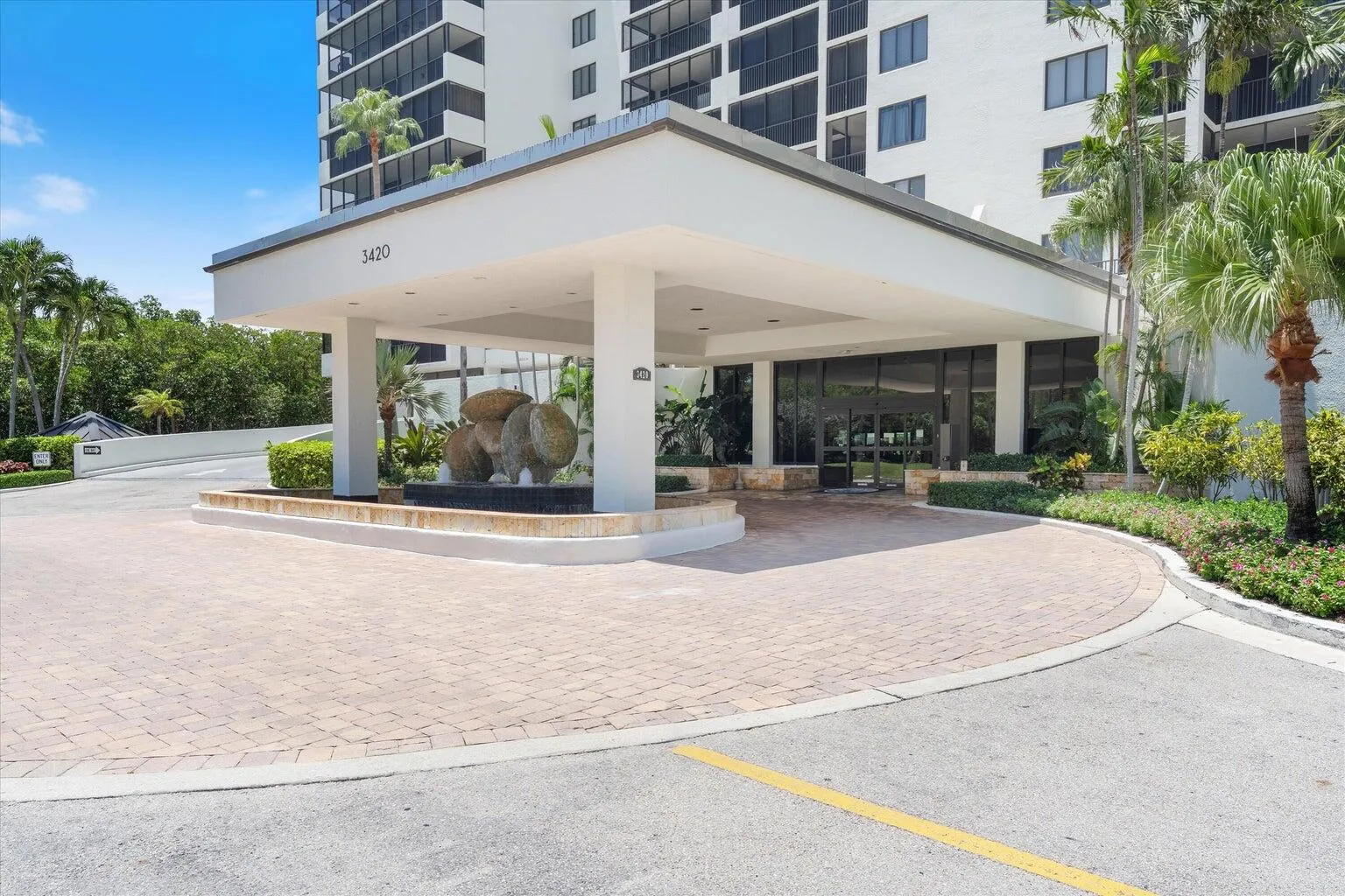 COVERED ENTRANCE AND GARAGE PARKING