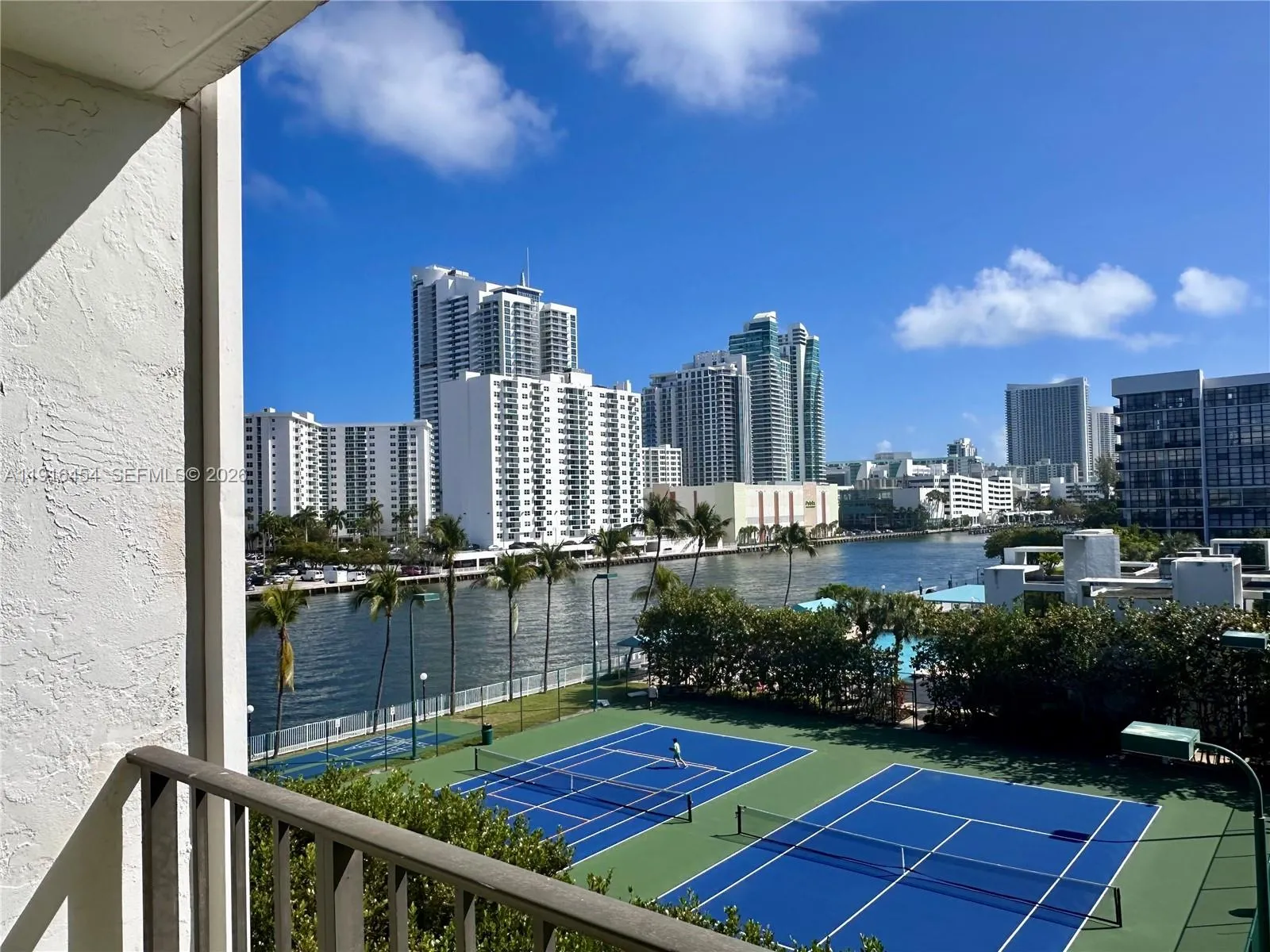 Morning coffee, reading the newspaper and watch Yachts pass by from your balcony? You got it! - Oceanview Park Condominium, Three Islands, Hallandale Beach, FL 33009. 1000 Parkview Drive, Unit #518.