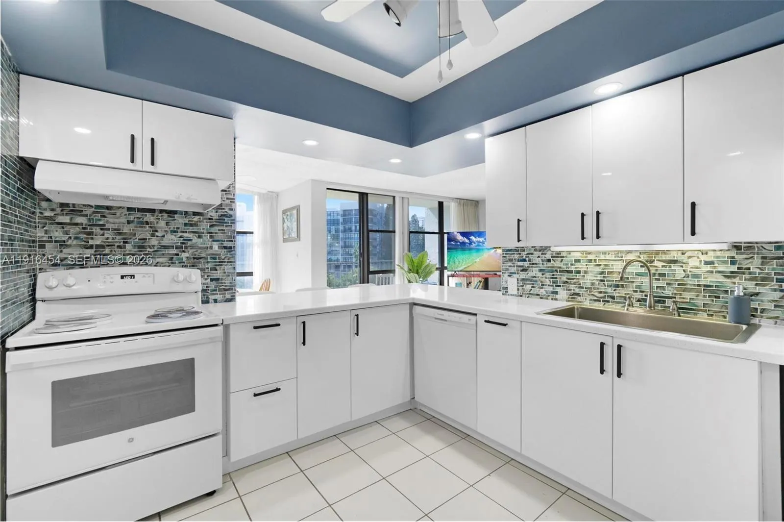 Updated, open kitchen, great to entertain and prepare gourmet meals. All with a view to the Intracoastal! - Oceanview Park Condominium, Three Islands, Hallandale Beach, FL 33009. 1000 Parkview Drive, Unit #518.