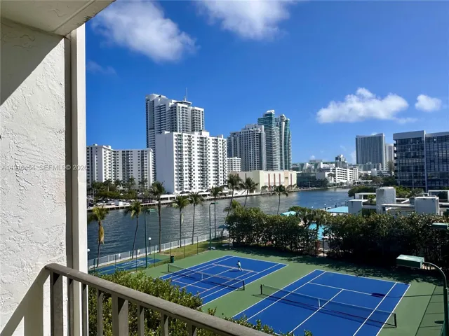 Morning coffee, reading the newspaper and watch Yachts pass by from your balcony? You got it! - Oceanview Park Condominium, Three Islands, Hallandale Beach, FL 33009. 1000 Parkview Drive, Unit #518.