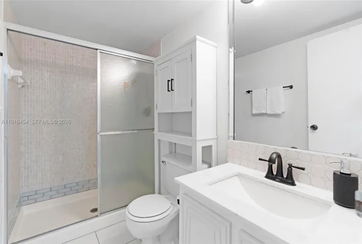 Full second bathroom with large walk-in shower. - Oceanview Park Condominium, Three Islands, Hallandale Beach, FL 33009. 1000 Parkview Drive, Unit #518.