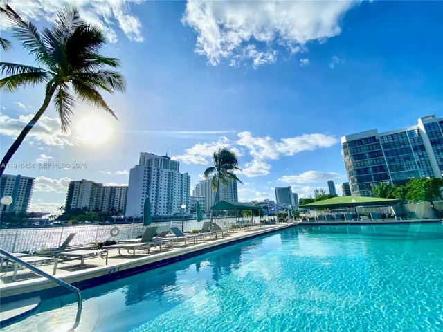 Waterfront Pool Area and Sun Deck! Picture perfect relaxation awaits you! - Oceanview Park Condominium, Three Islands, Hallandale Beach, FL 33009. 1000 Parkview Drive, Unit #518.