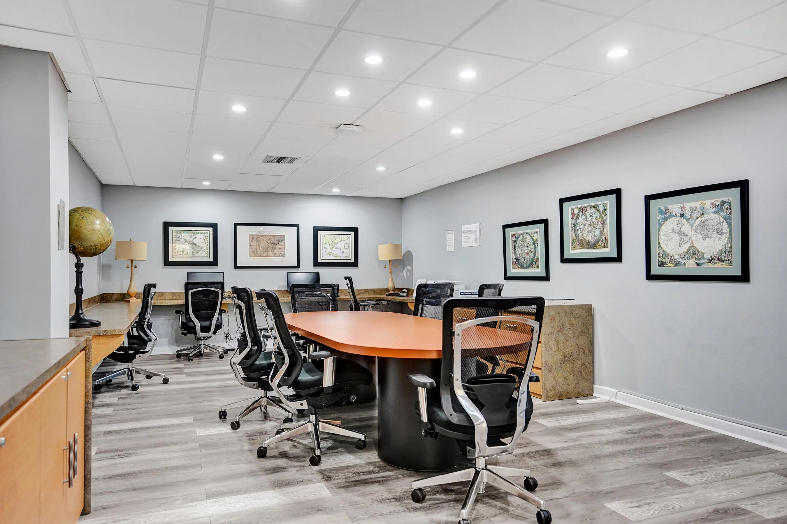 Resort style Business center and conference room setup with computers