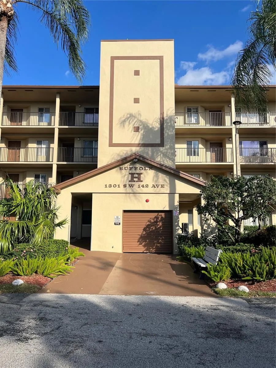 main entrance at center of bldg with elevator access / trash chut / mail boxes parking space for 301-H is directly in front for easy access