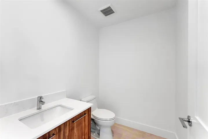 1/2 BATHROOM IN THE DEN