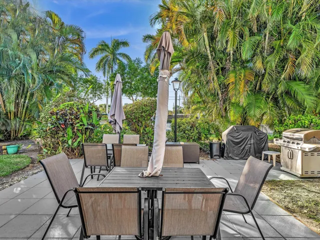 Patio Area with Umbrellas and BBQ