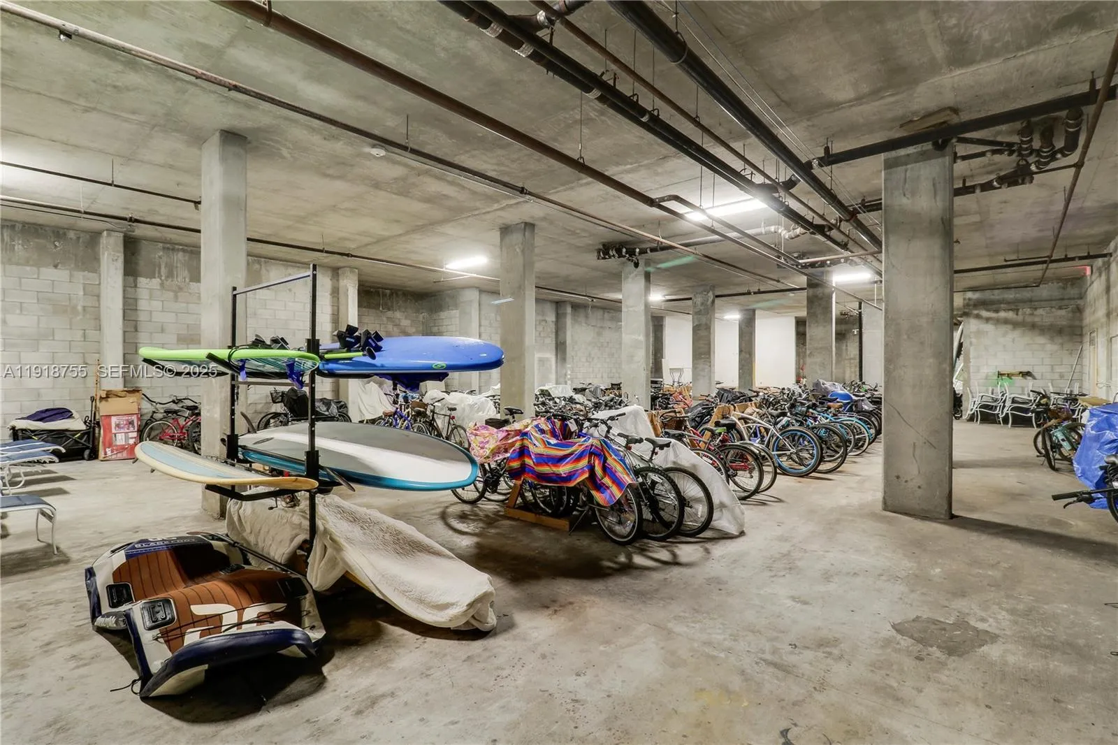 Kayak, paddleboard, and bicycle storage room located in the garage.
