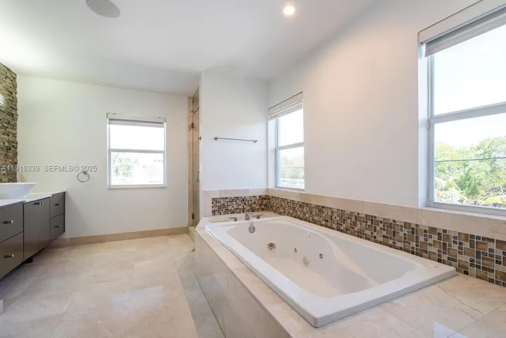 Main bathroom #3 with separated vanities