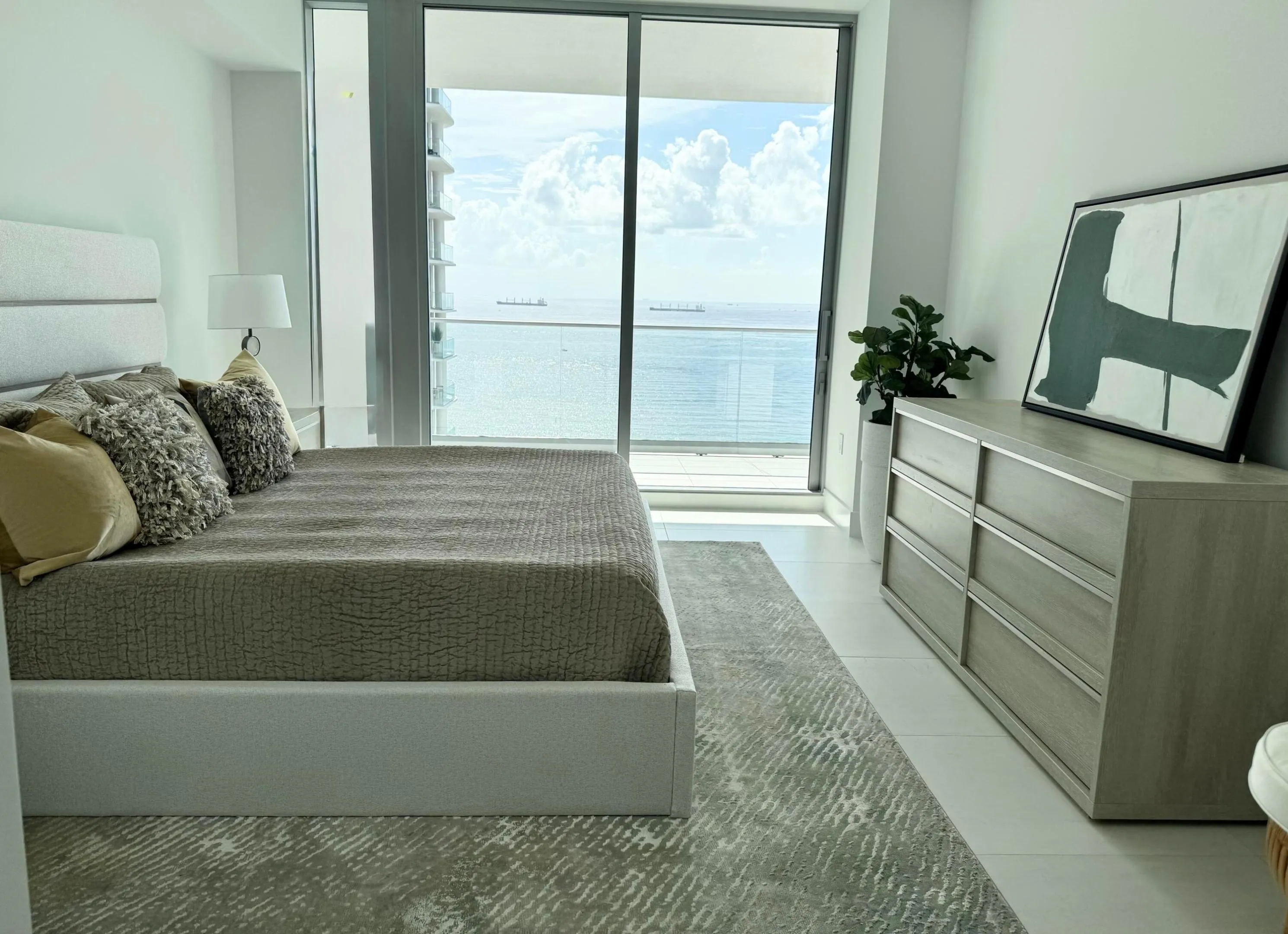 Ocean view and terrace access in primary bedroom