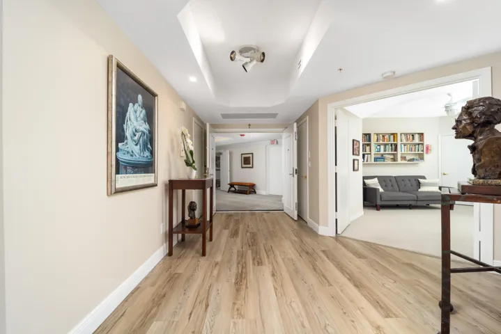 Looking out the front door with 3rd bedroom/office space