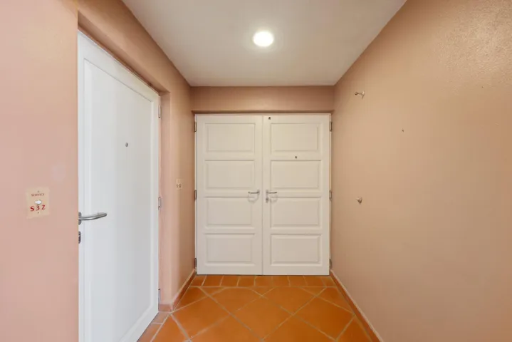 Front Entry to Condominium/Service Door on Side