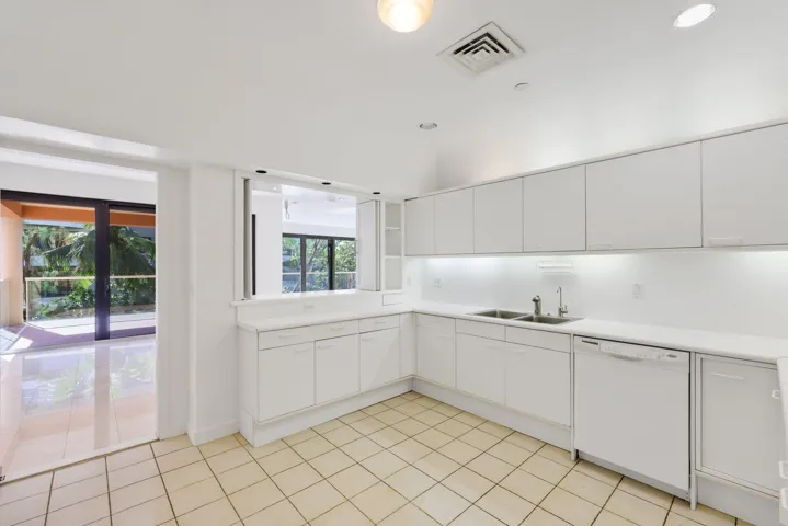 Kitchen with Swing Door/Island Opening/Cabinetry