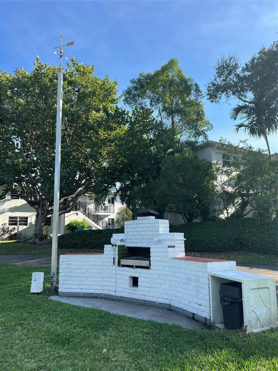 BBQ area near pool and lake
