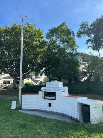 BBQ area near pool and lake