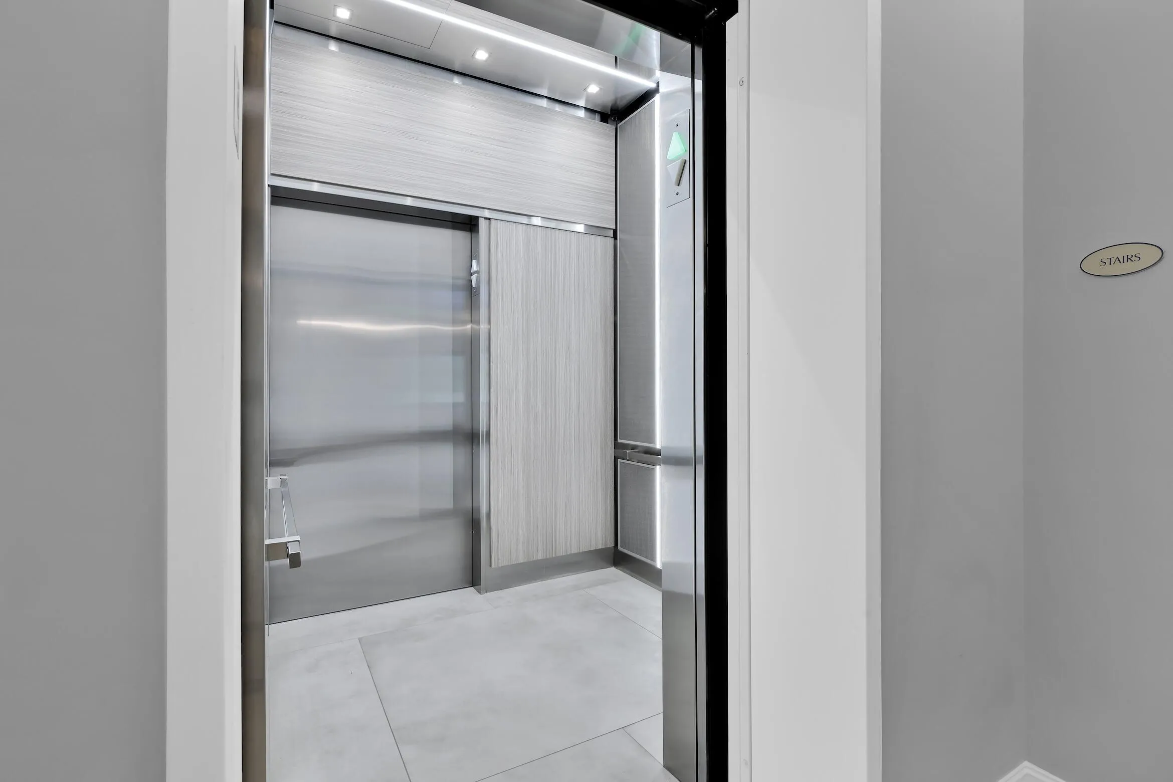 Modern elevator takes you directly into the private foyer of the residence