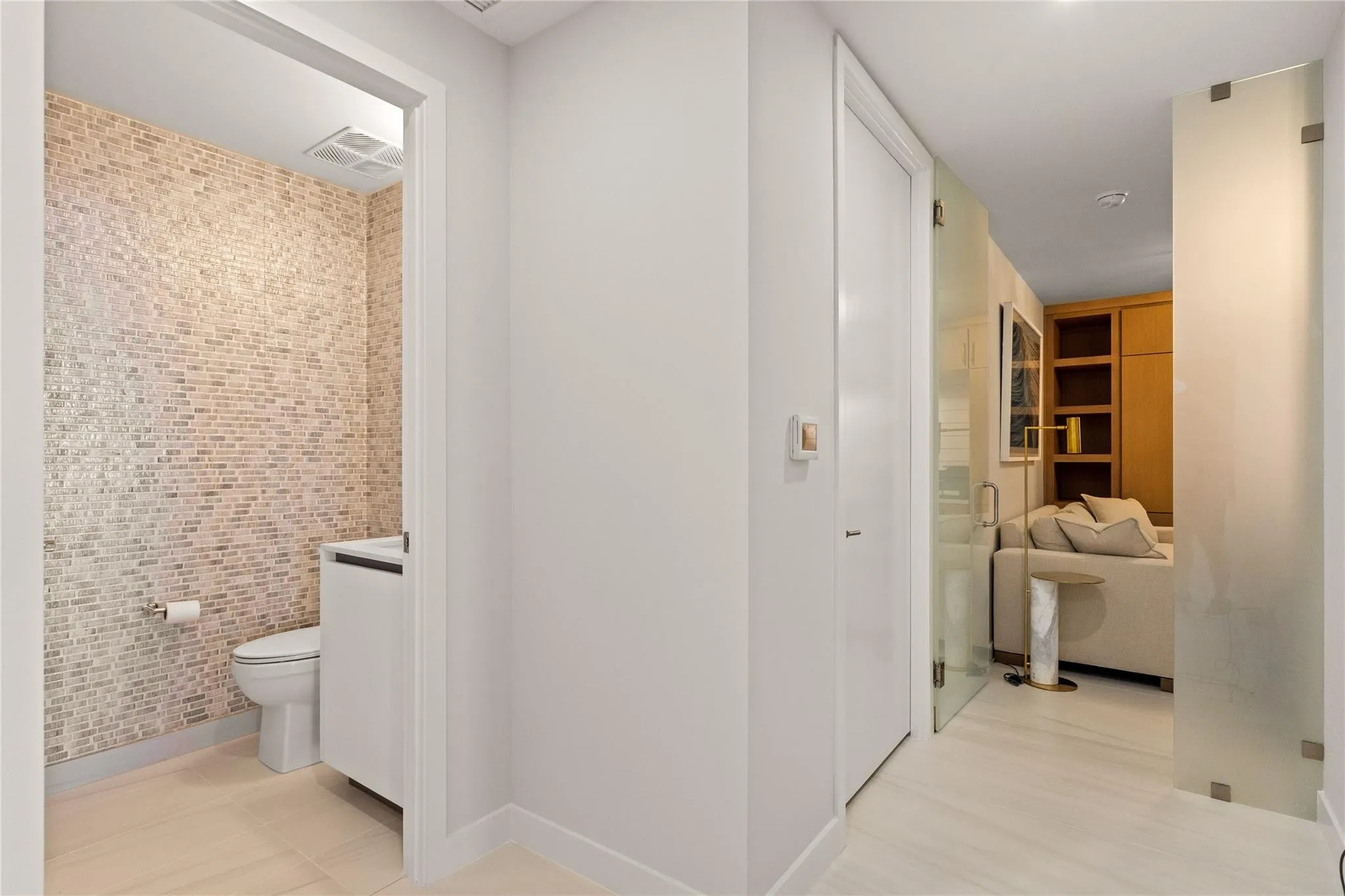 1/2 bath, Den, 3rd bedroom/office with privacy glass enclosure door