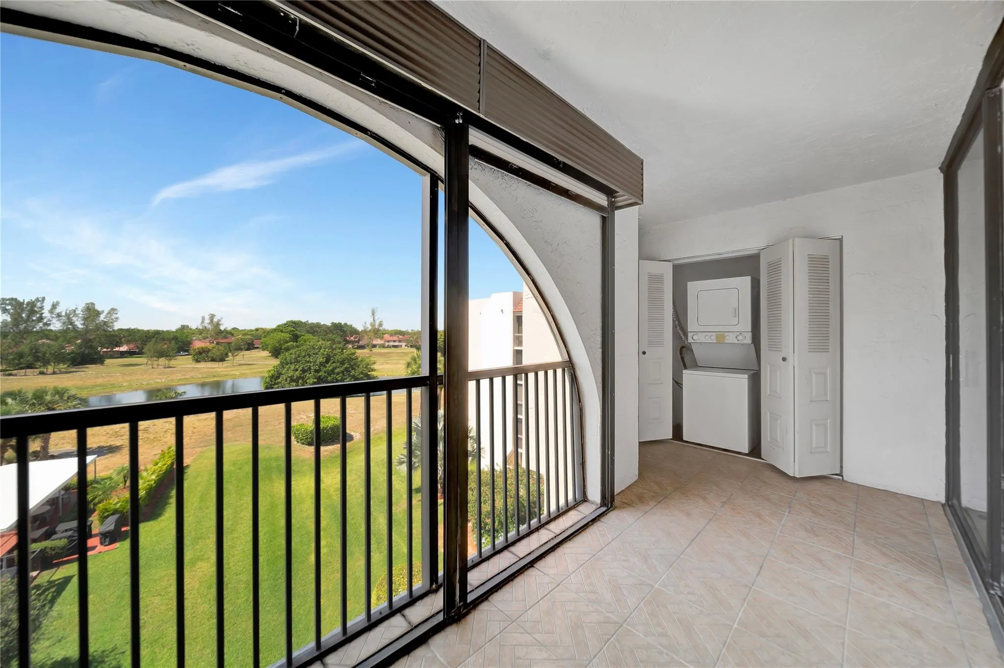Beautiful View From Large Screened Balcony; Washer/Dryer on Balcony