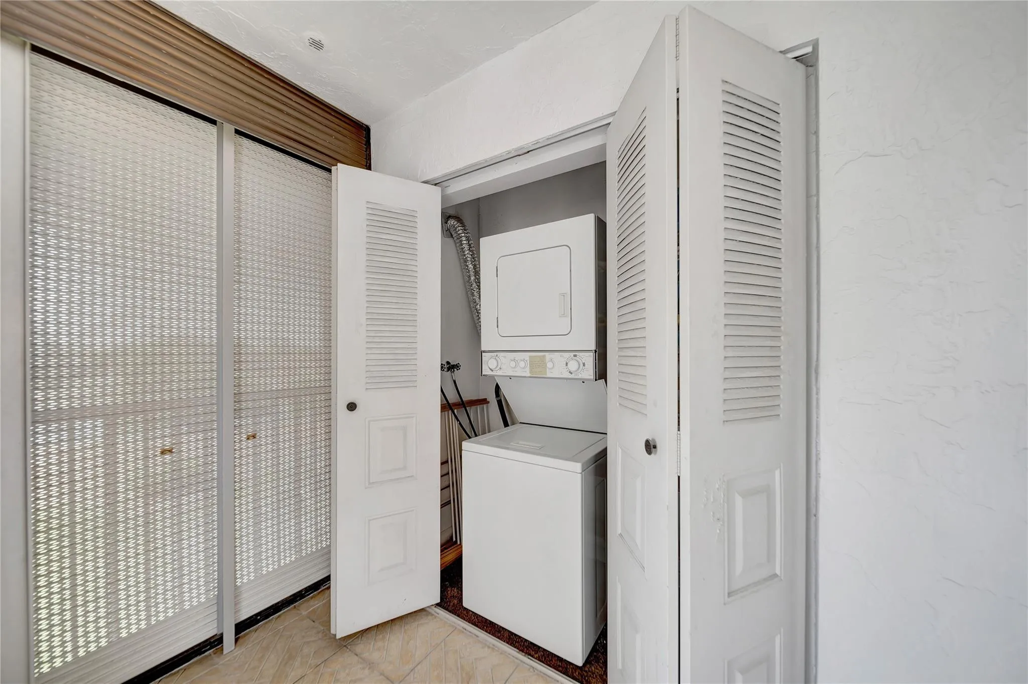 In-Unit Washer/Dryer located on Screened Balcony
