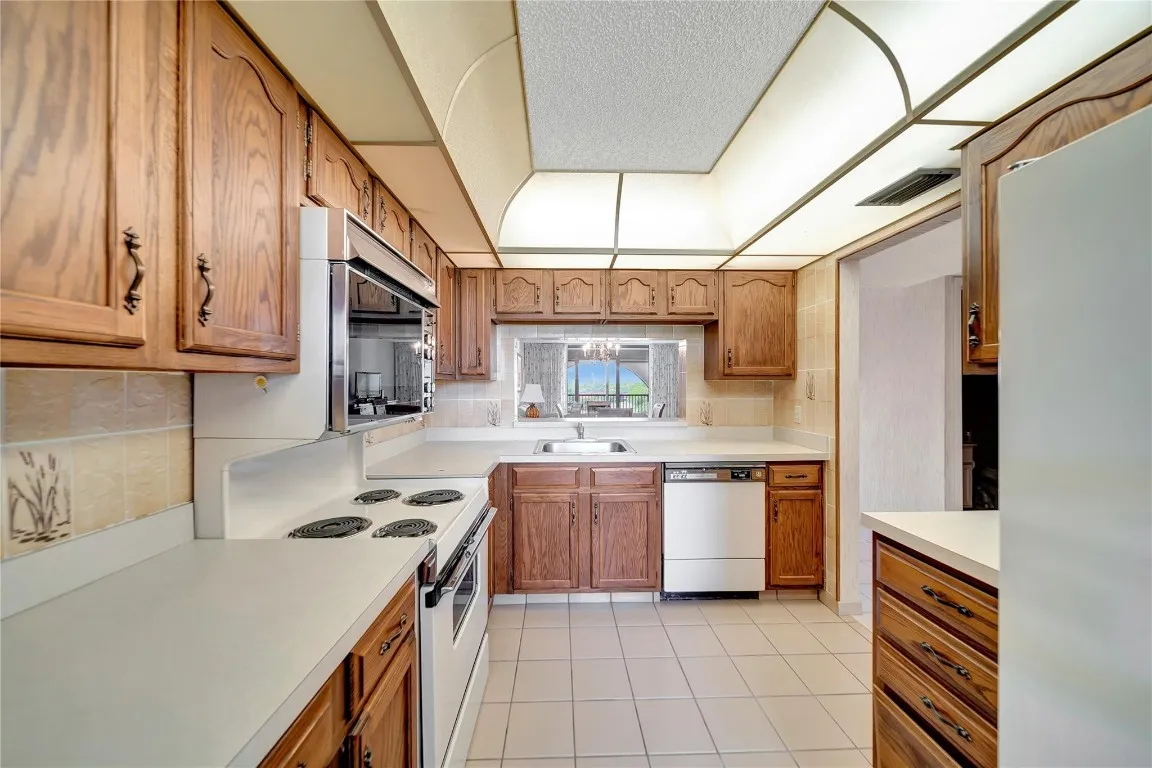 Kitchen With Pass-Through To Dining Room