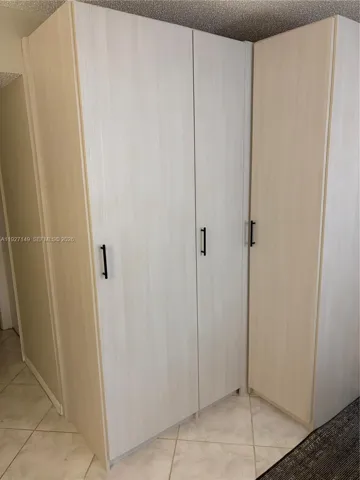 Decorative custom made storage unit in diningroon/livinroom area.