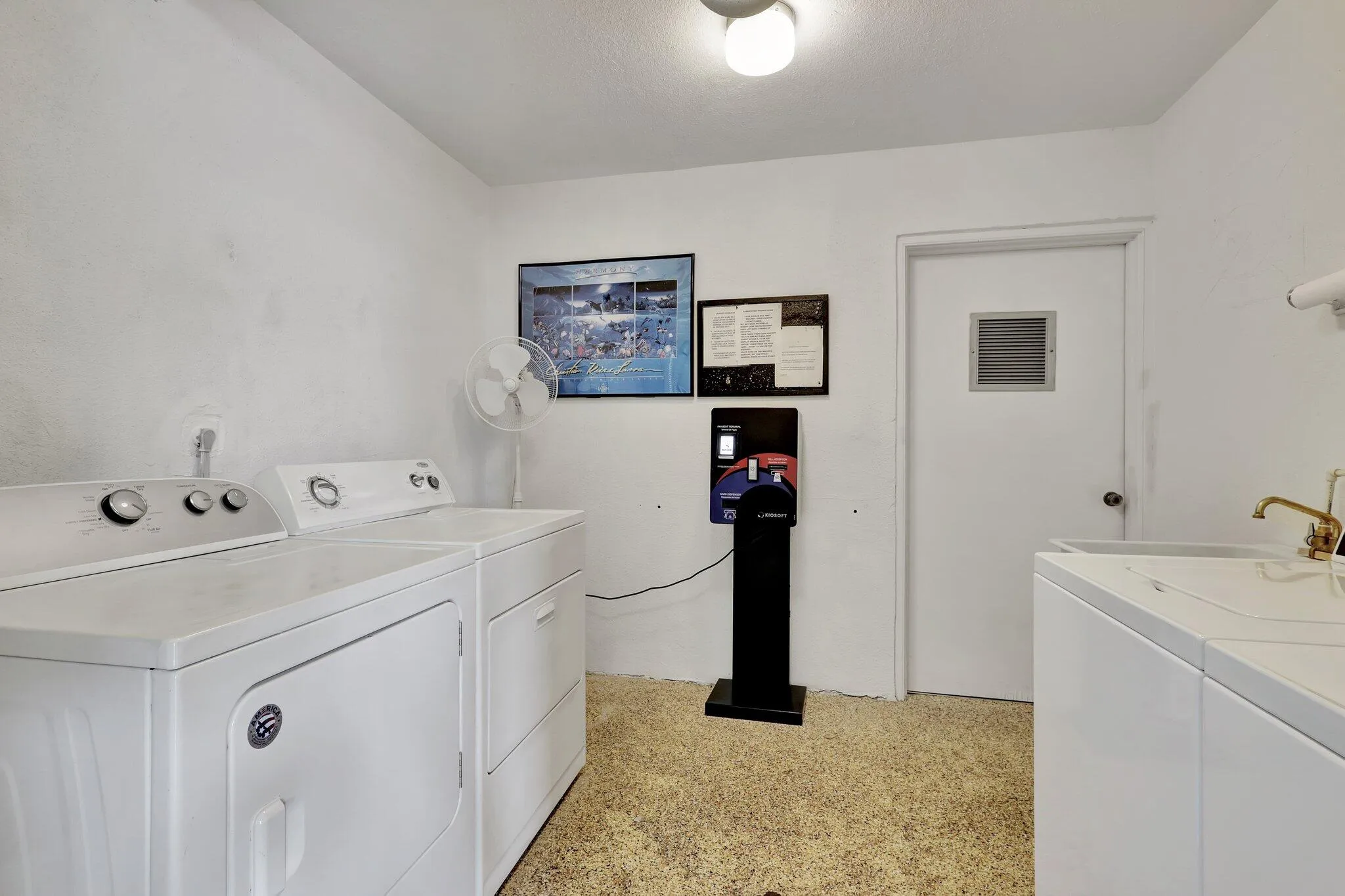 105 Paradise Harbour 307 laundry room
