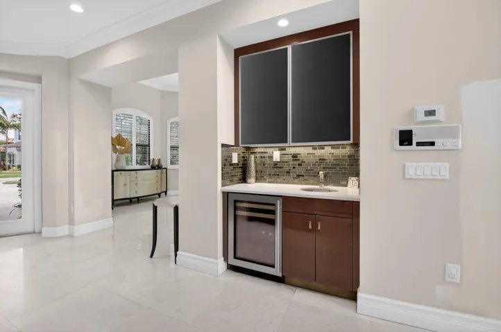 UPGRADED SINK AND CABINETS WITH REFRIGERATOR