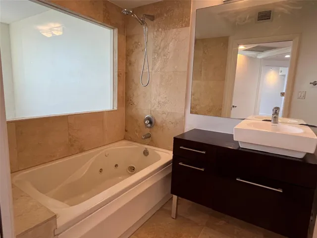 Primary Bath with Shower/tub combo w/jets and Italian stone