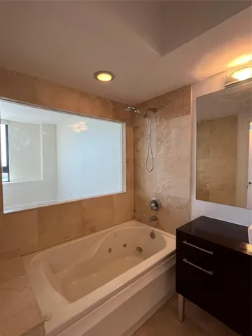 Primary Bath with Shower/tub combo w/jets and Italian stone