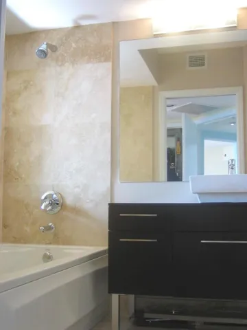 Primary Bathroom - Custom vanity/sink and Italian stone