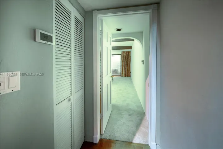 Corridor going to the primary bedroom