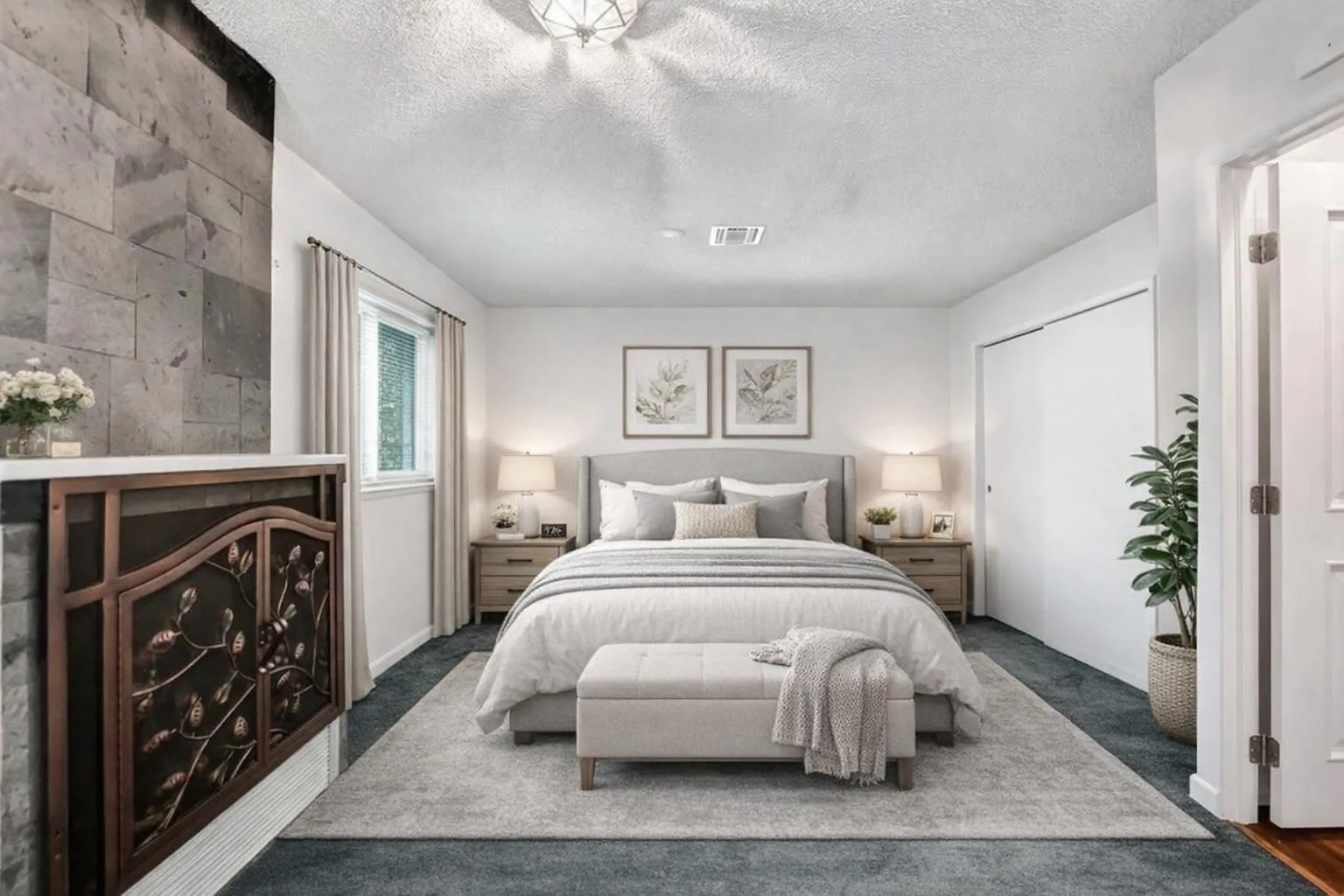 Primary bedroom with large sitting area. Virtually staged.