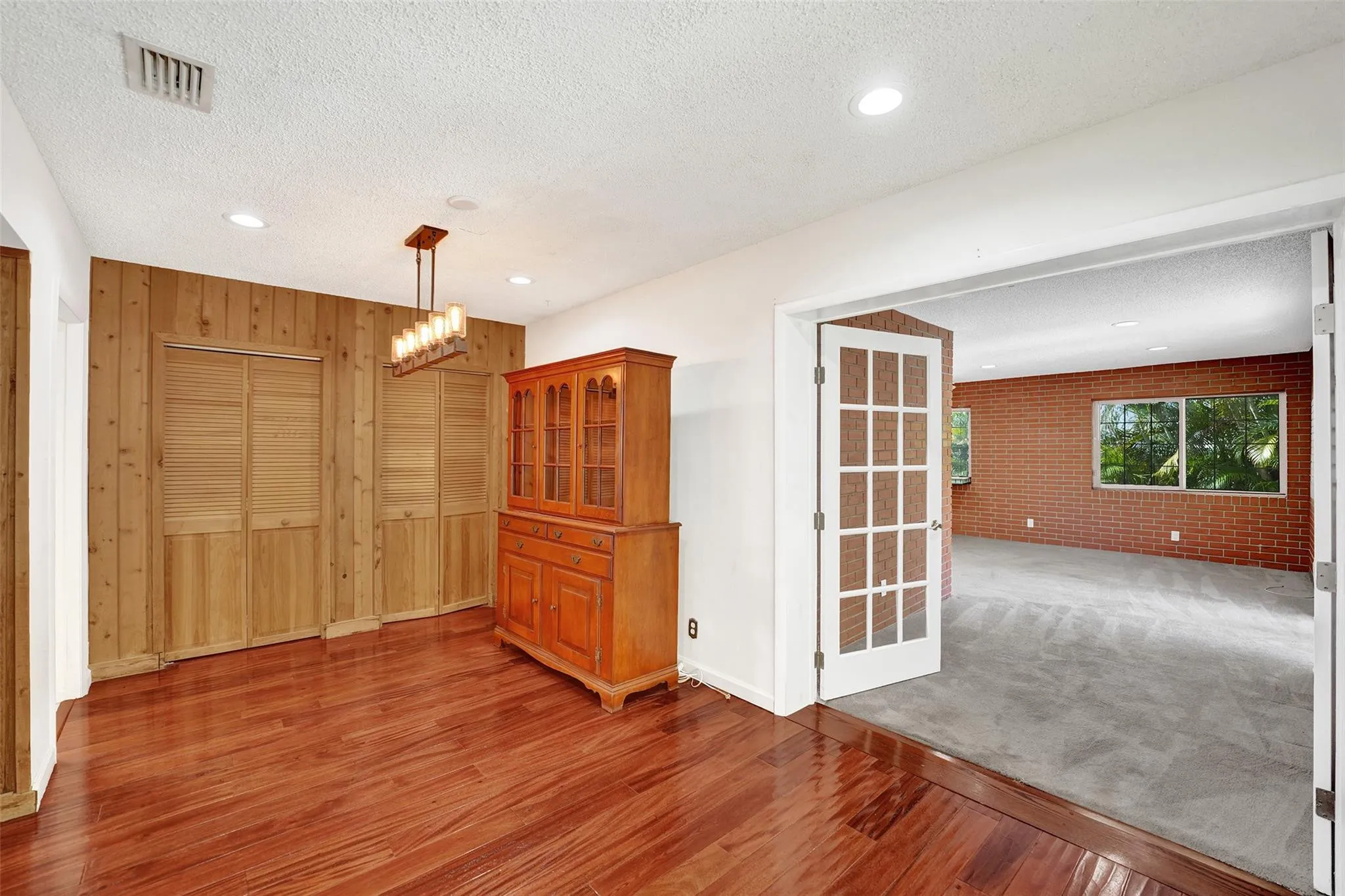 Dining area on the left entrance to spacious bedroom/bath on right.
