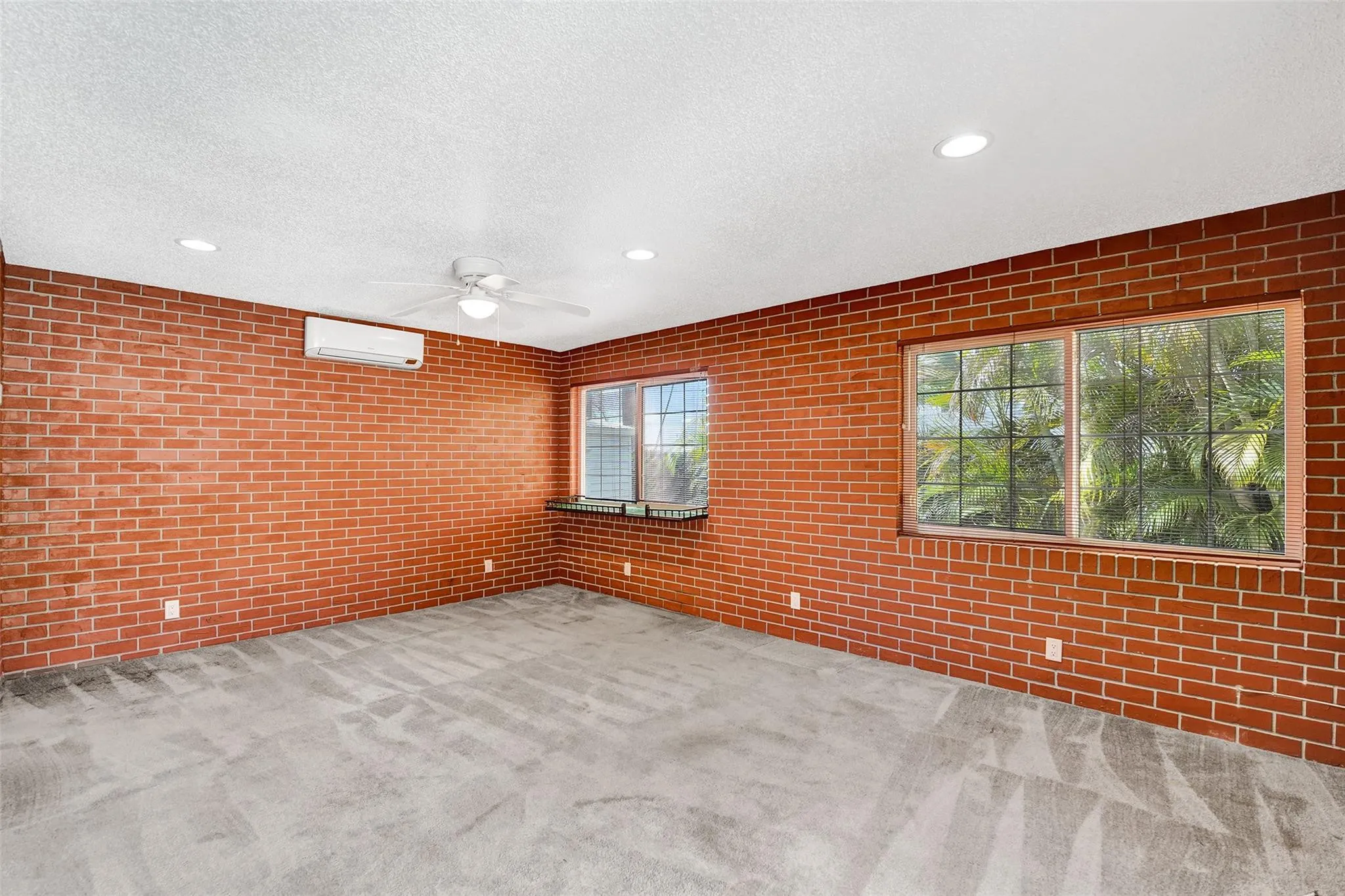 Large third bedroom/bath in-law suite with private entrance and pool views.
