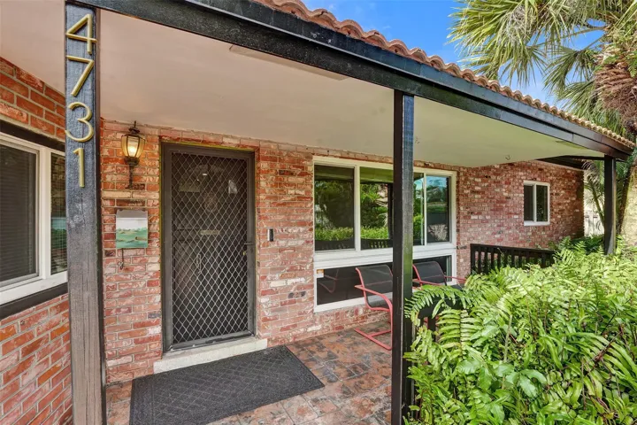 Large front covered patio.