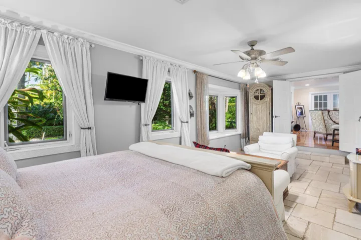1st Primary Suite with walk in closet and bay window