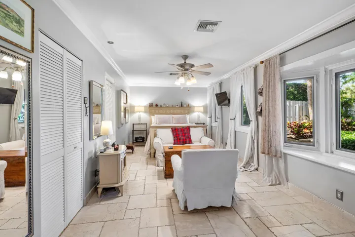 1st Primary Suite with walk in closet and bay window