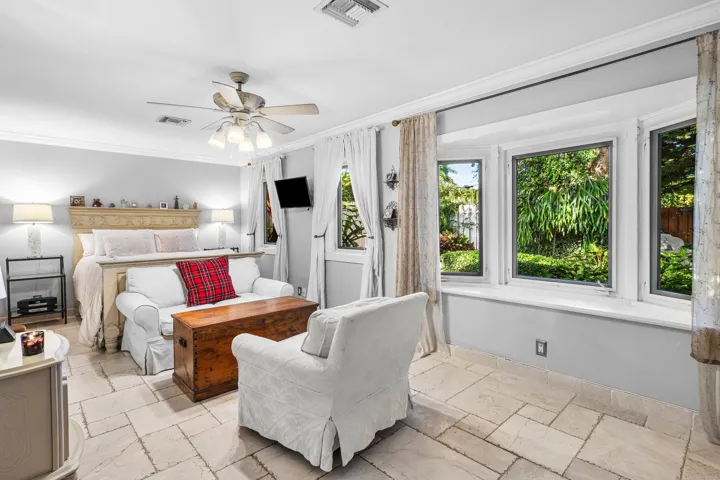 1st Primary Suite with walk in closet and bay window