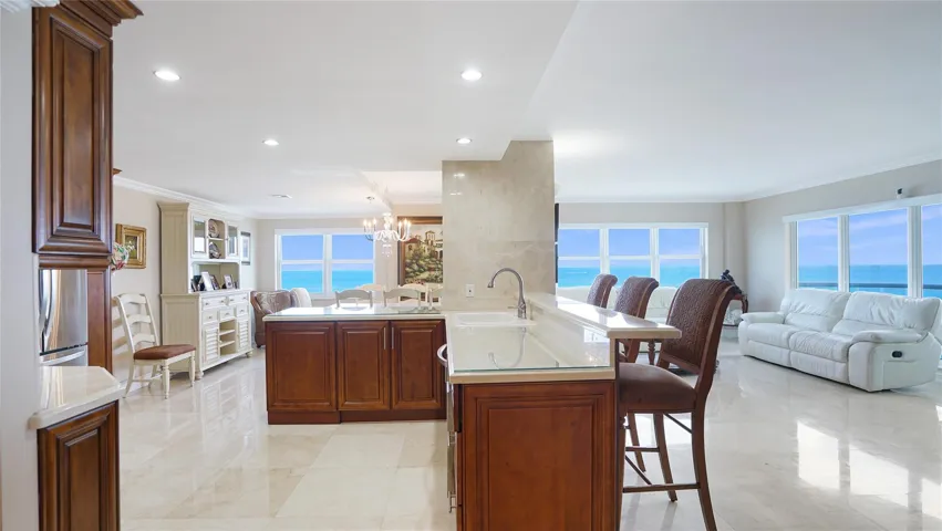 Step into this east-southeast facing corner apartment and be greeted by stunning eye level ocean views.