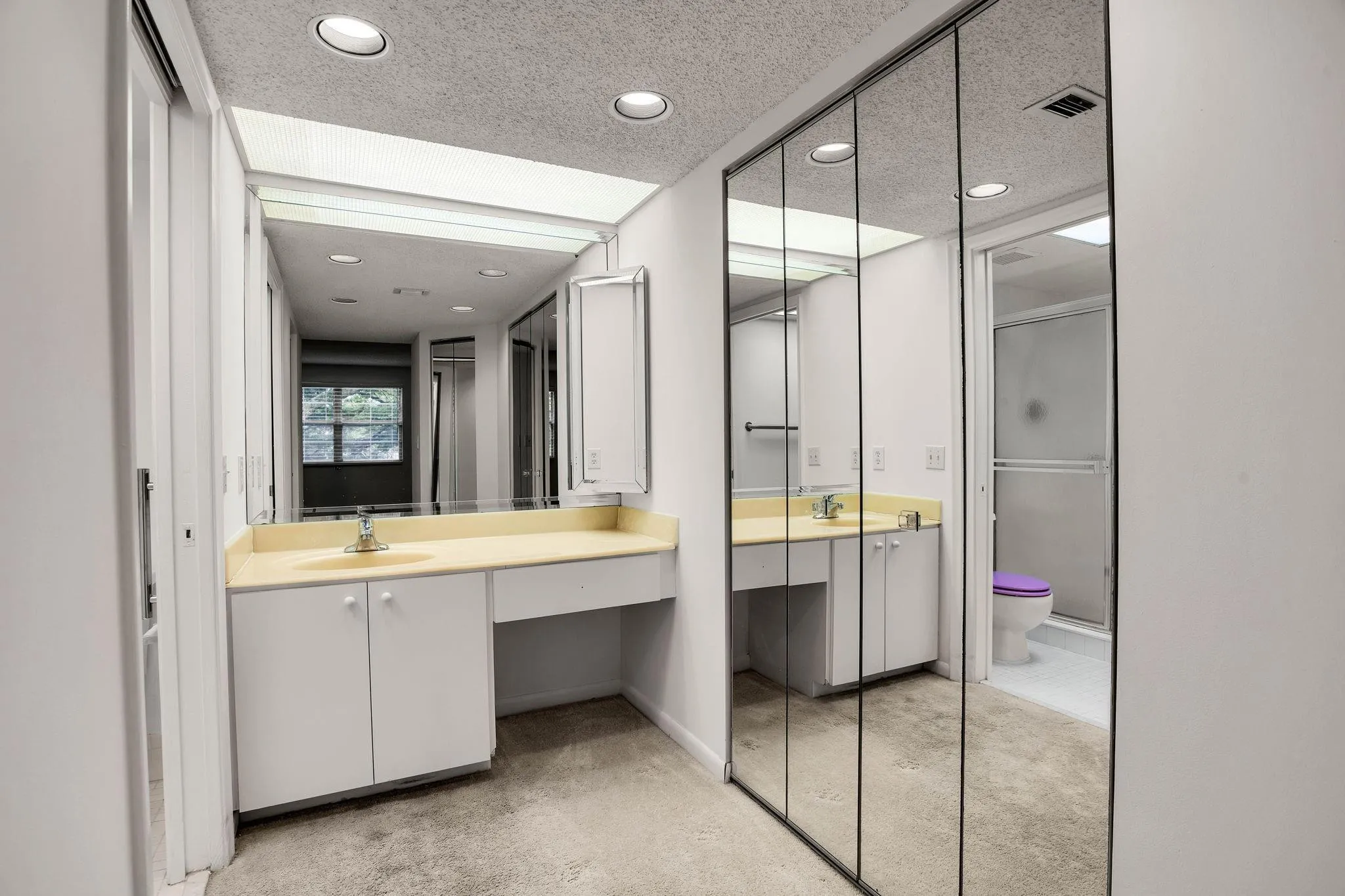 MASTER BATHROOM HIS/HER CLOSETS