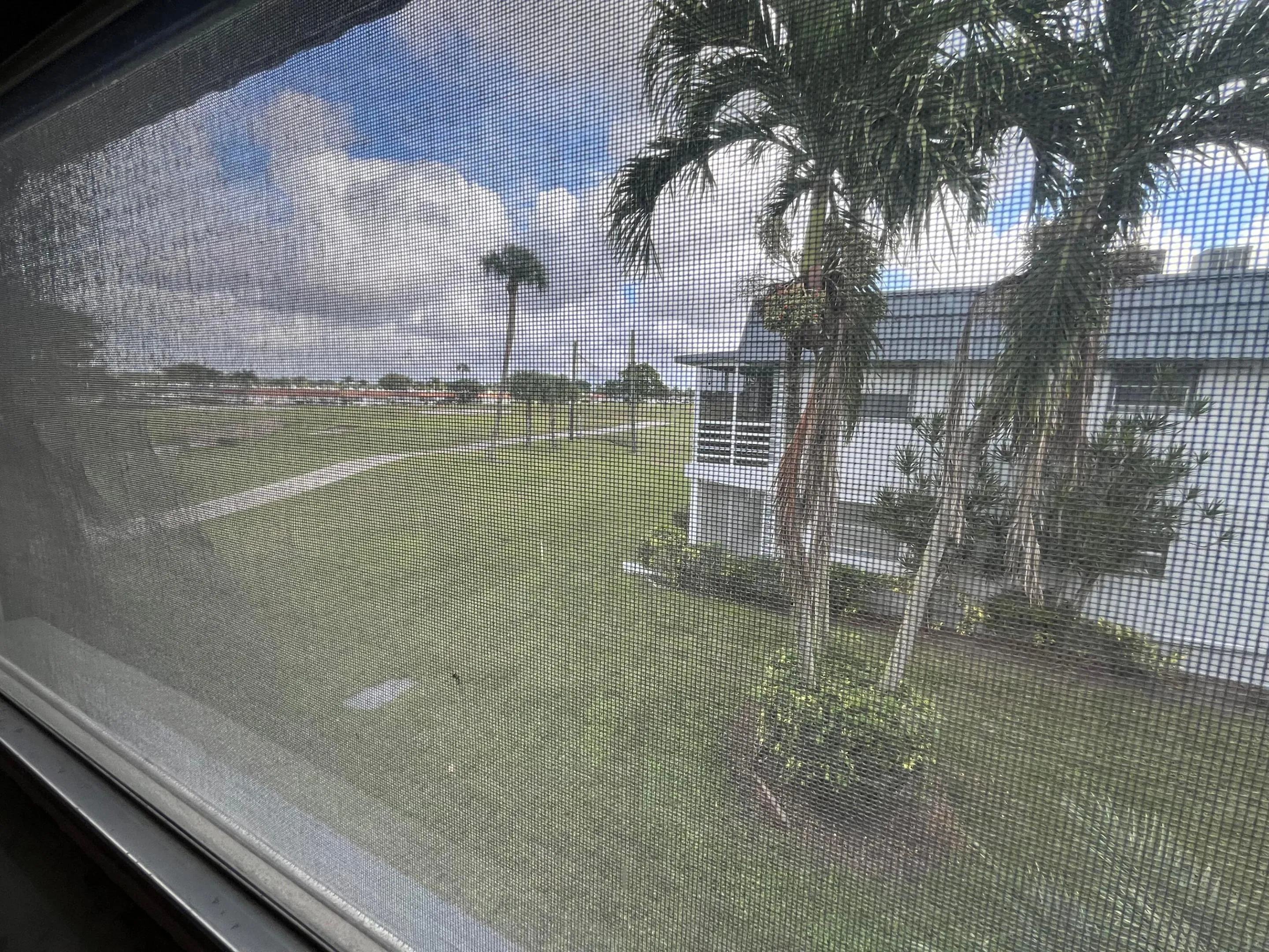 from bedroom window outward to the golf course and landscaping