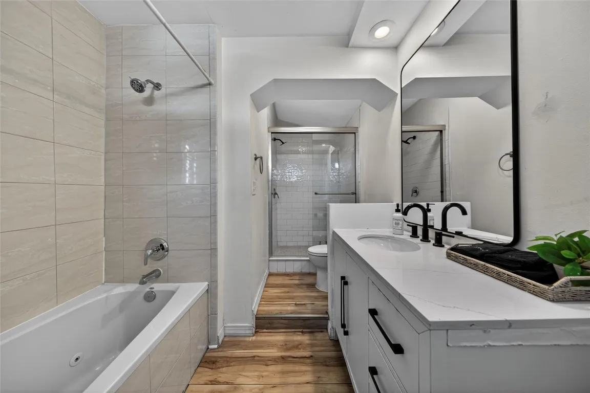 Primary bath has tub and shower