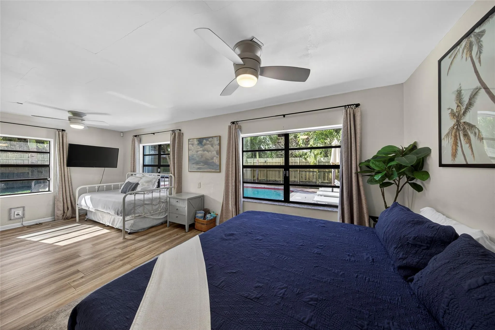 Primary bedroom overlooks your private pool.