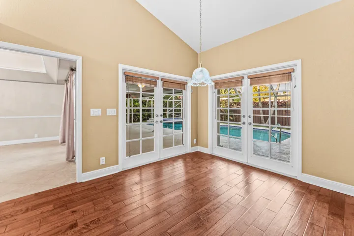French doors looking onto patio and pool area